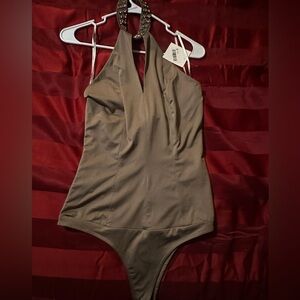 New never worn Brown Bodysuit. Size medium.